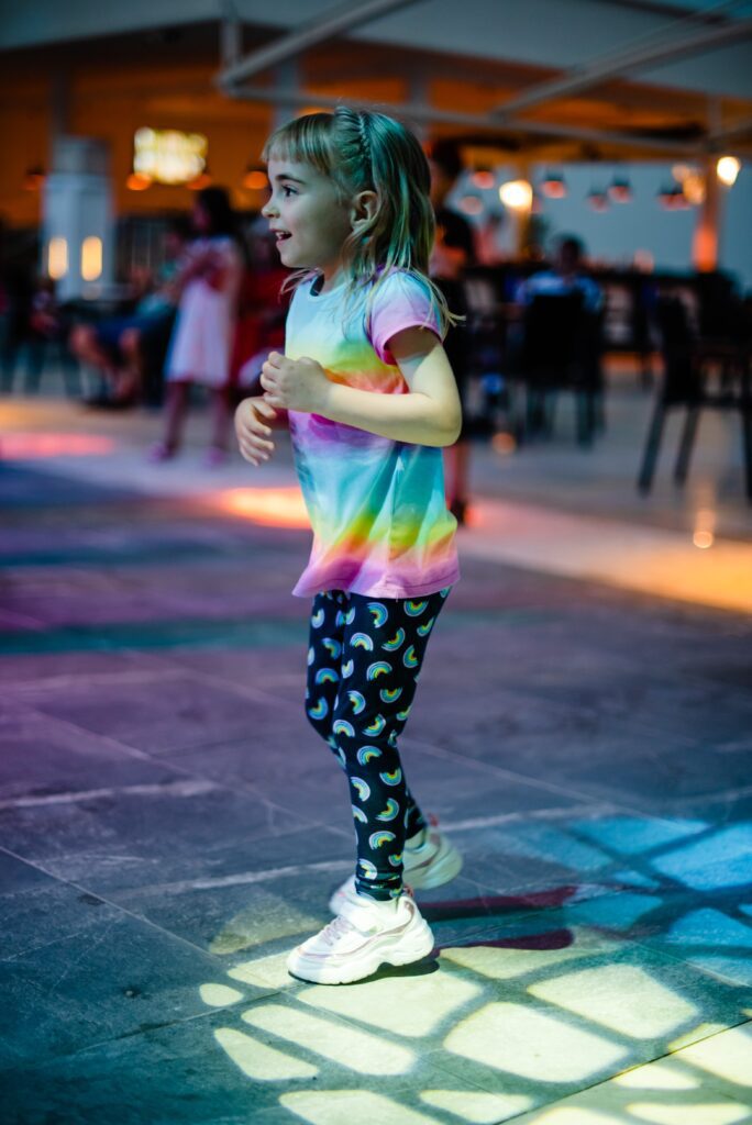 little girl dancing on the kids mini disco